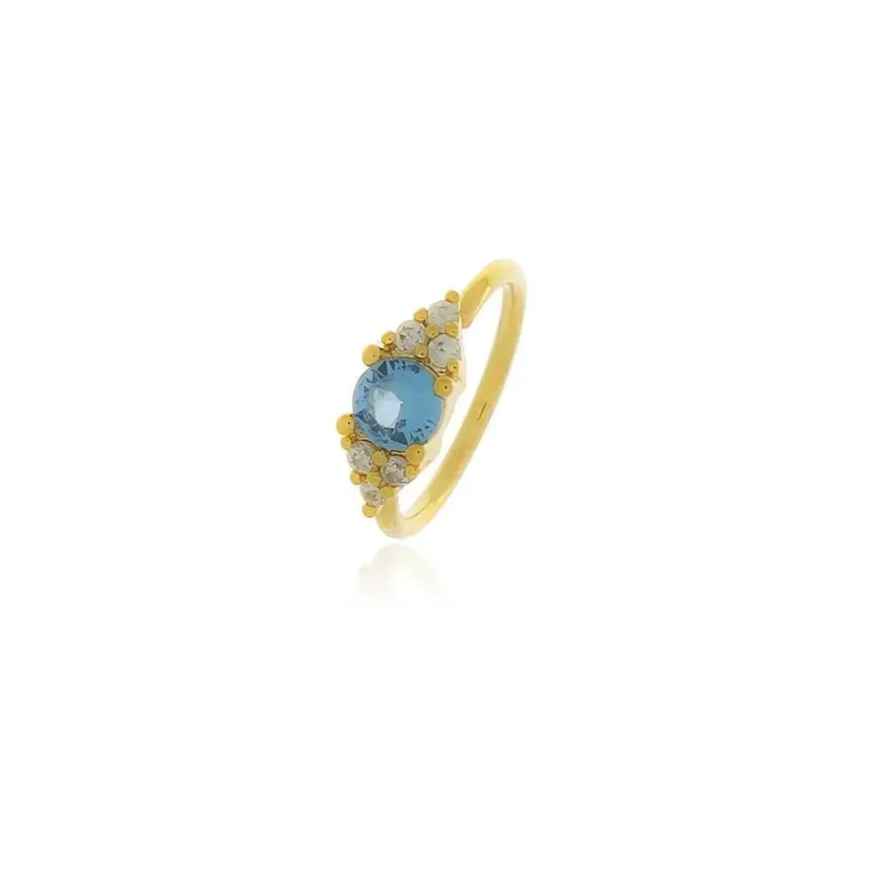PIERCING FURO AGUA MARINHA CRAVEJADO EM ZIRCONIAS NO CRISTAL