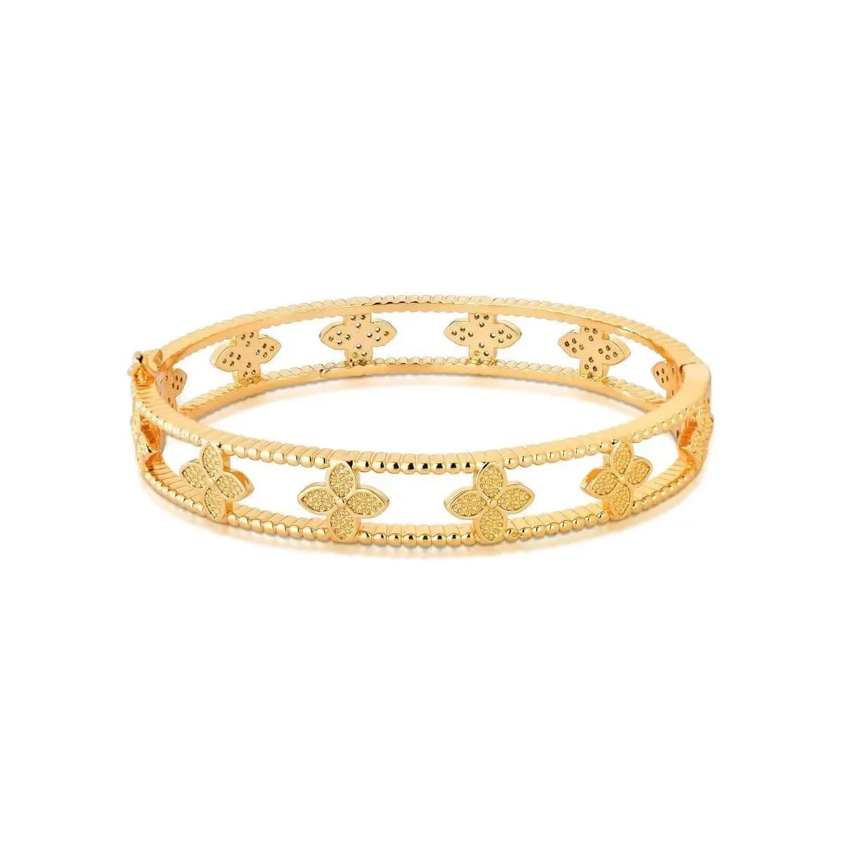 BRACELETE VAZADO COM TREVOS CRAVEJADOS COM ZIRCÔNIAS