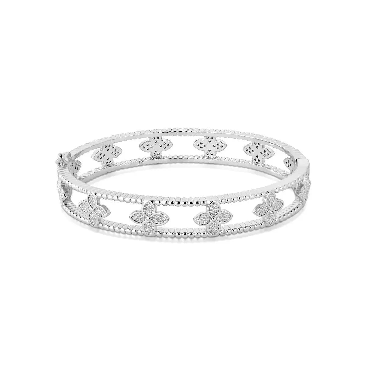 BRACELETE VAZADO COM TREVOS CRAVEJADOS COM ZIRCÔNIAS — Ban. Ródio Branco